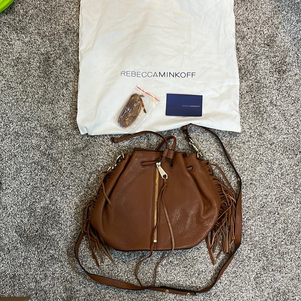 Rebecca Minkoff Fringe Moto Bucket Bag in a cognac color